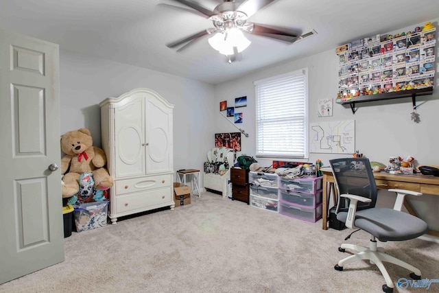 office space featuring ceiling fan and carpet