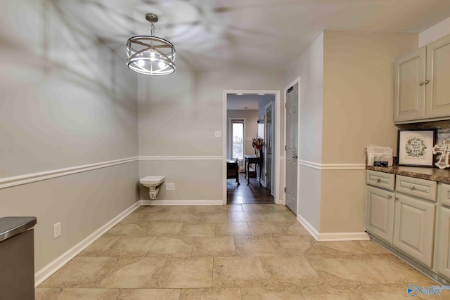 interior space featuring a notable chandelier