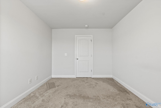 spare room with carpet