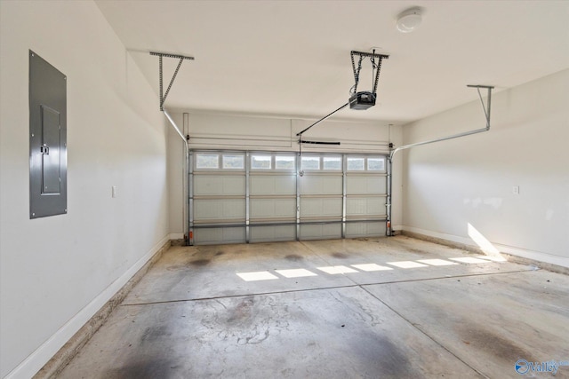 garage featuring electric panel and a garage door opener