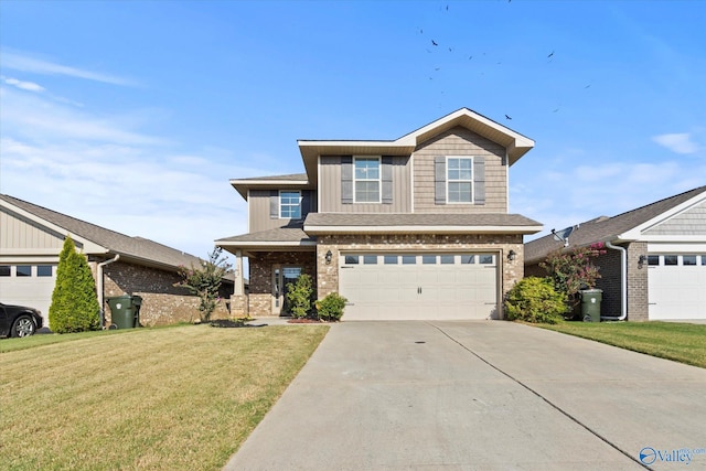 view of front facade with a garage and a front lawn