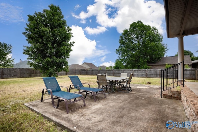 view of patio / terrace featuring a fenced backyard and outdoor dining space