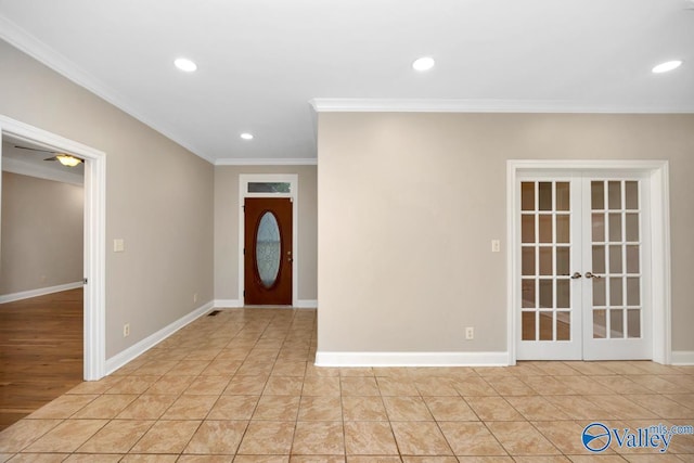 foyer entrance featuring baseboards, recessed lighting, french doors, and crown molding