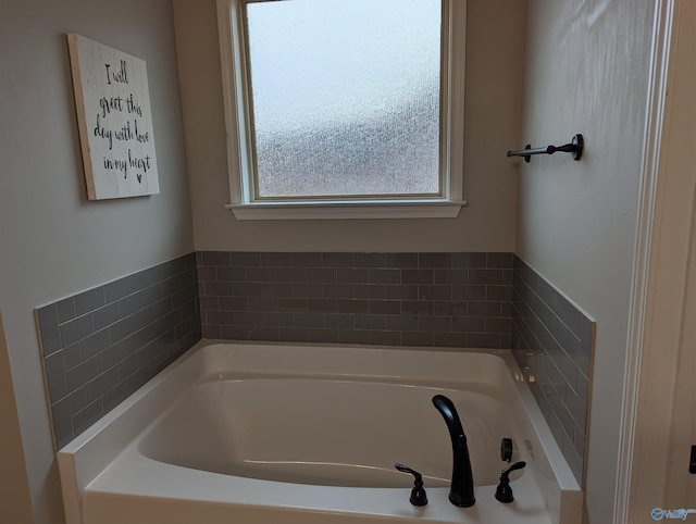 bathroom featuring a washtub