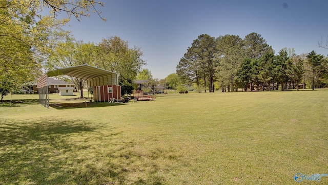 view of yard featuring a carport