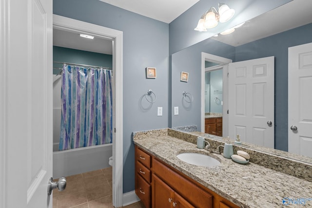 full bath with shower / bath combo, tile patterned flooring, vanity, toilet, and baseboards