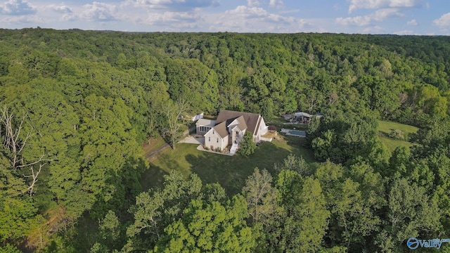 bird's eye view featuring a view of trees