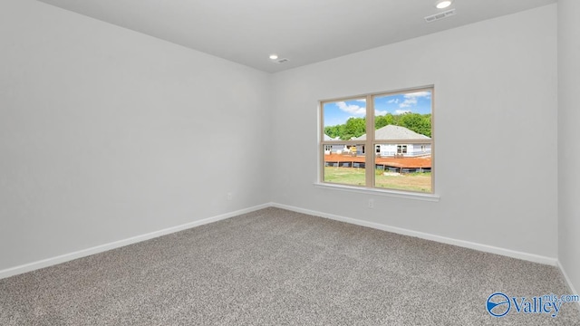 view of carpeted spare room