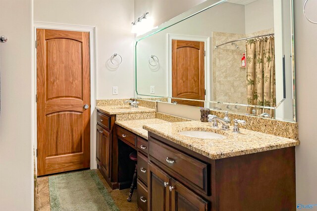 bathroom featuring dual vanity and tile patterned flooring