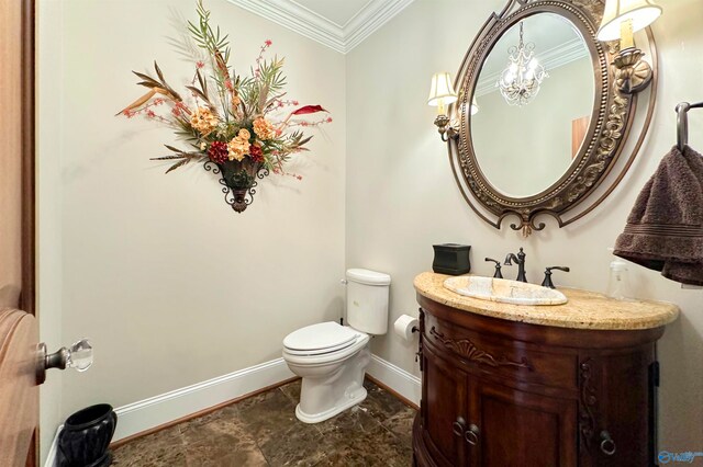 bathroom featuring tile patterned flooring, an inviting chandelier, toilet, vanity, and ornamental molding