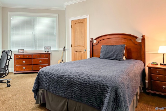 carpeted bedroom with baseboards and ornamental molding