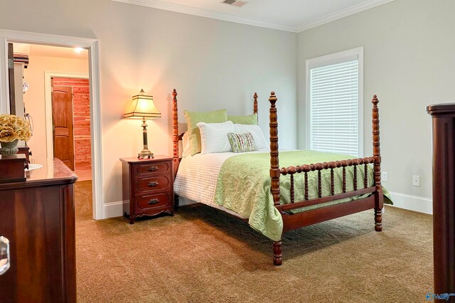 carpeted bedroom with ornamental molding