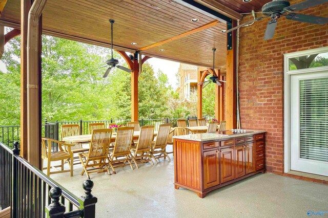 view of patio with ceiling fan