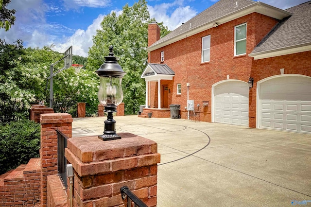 exterior space with a garage