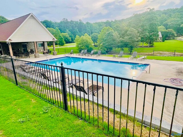 view of pool featuring a patio area