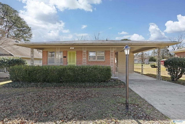 view of front of home featuring a carport