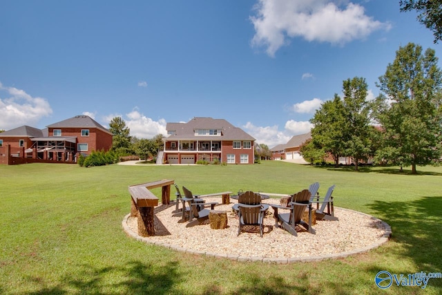 view of yard with a fire pit and a deck