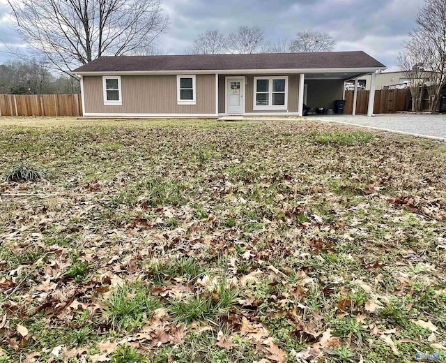 single story home with a carport