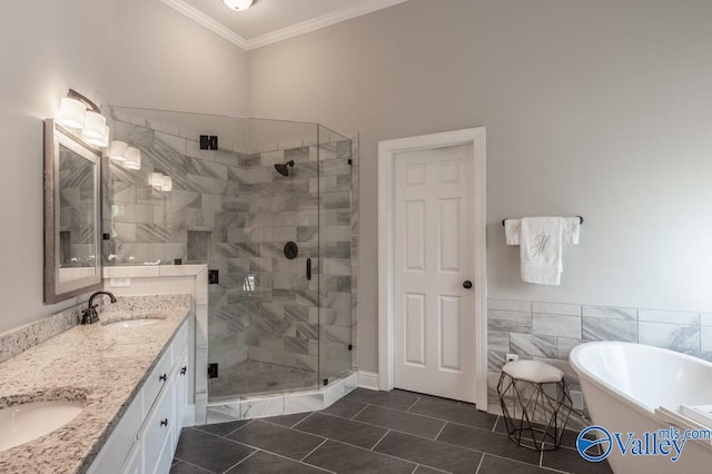 bathroom with ornamental molding, shower with separate bathtub, tile patterned floors, and vanity