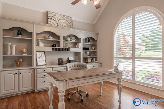 office space with vaulted ceiling, ceiling fan, plenty of natural light, and hardwood / wood-style floors