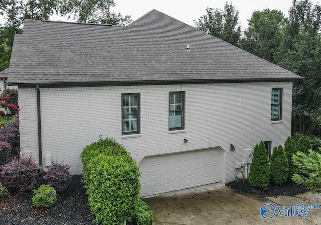 view of home's exterior with a garage