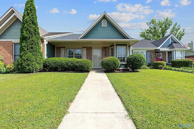 328 Shadow Pointe Dr SW, Decatur, AL 35601 - view of front of home featuring brick siding and a front yard
