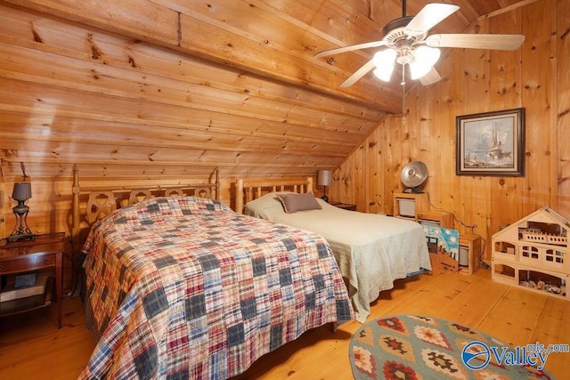 bedroom featuring vaulted ceiling, ceiling fan, wood ceiling, and light hardwood / wood-style flooring