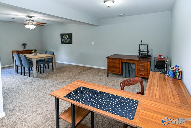 kitchen with light tile patterned floors, dark countertops, appliances with stainless steel finishes, dark brown cabinets, and under cabinet range hood