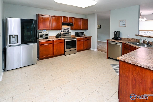 carpeted office featuring ceiling fan and baseboards