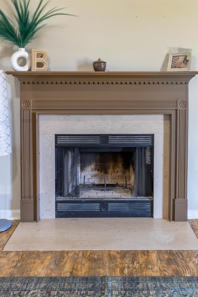 details featuring a high end fireplace