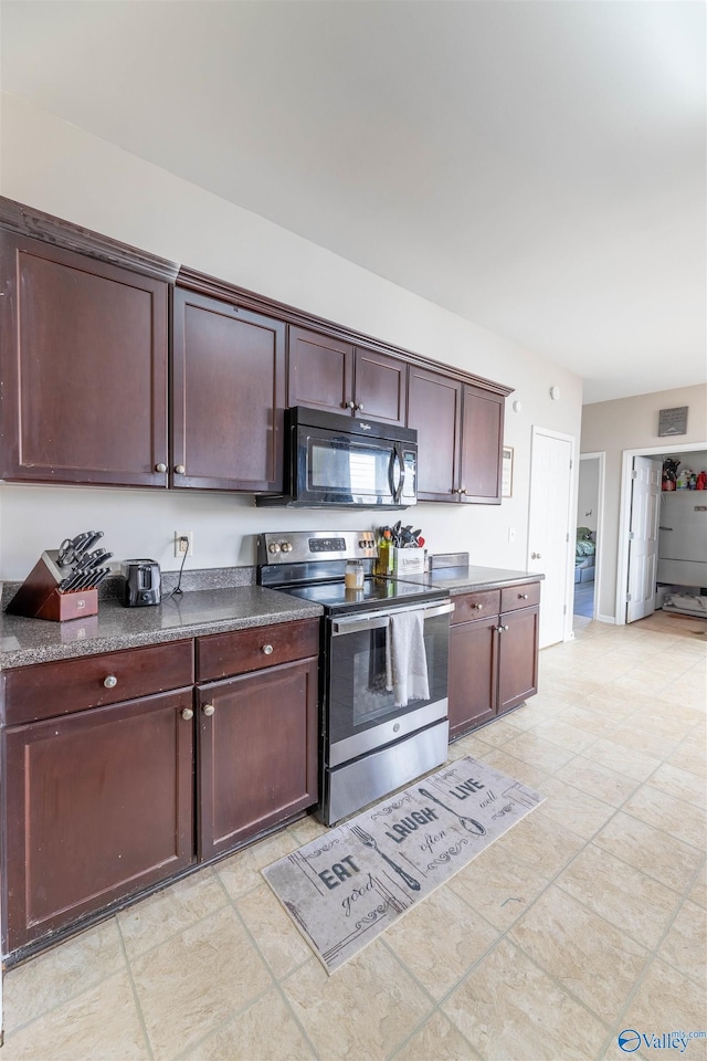 kitchen with dark countertops, stainless steel range with electric stovetop, dark brown cabinetry, and black microwave