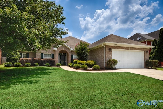 119 Cannes Dr, Brownsboro, AL 35741 - single story home with brick siding, an attached garage, a front yard, and driveway