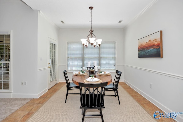 119 Cannes Dr, Brownsboro, AL 35741 - dining space with a chandelier, light tile patterned floors, and ornamental molding