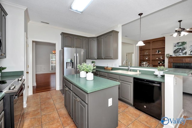 119 Cannes Dr, Brownsboro, AL 35741 - kitchen with black appliances, gray cabinetry, a ceiling fan, crown molding, and a kitchen island