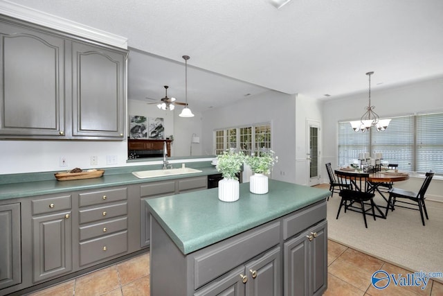 119 Cannes Dr, Brownsboro, AL 35741 - kitchen featuring gray cabinetry, ceiling fan, a chandelier, hanging light fixtures, and a center island