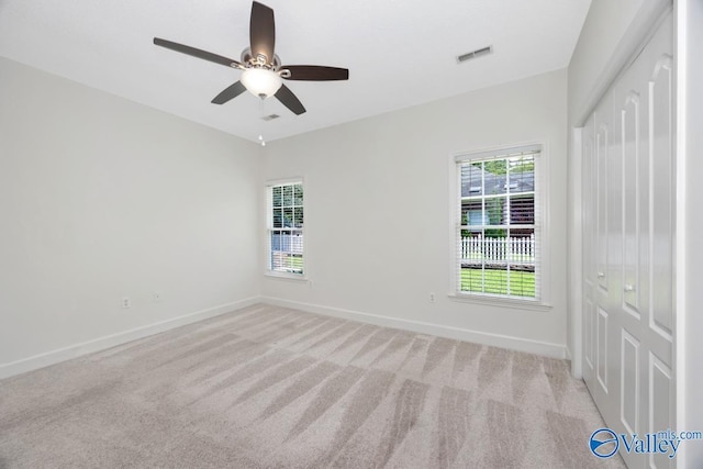 119 Cannes Dr, Brownsboro, AL 35741 - unfurnished bedroom featuring a closet, carpet, and ceiling fan
