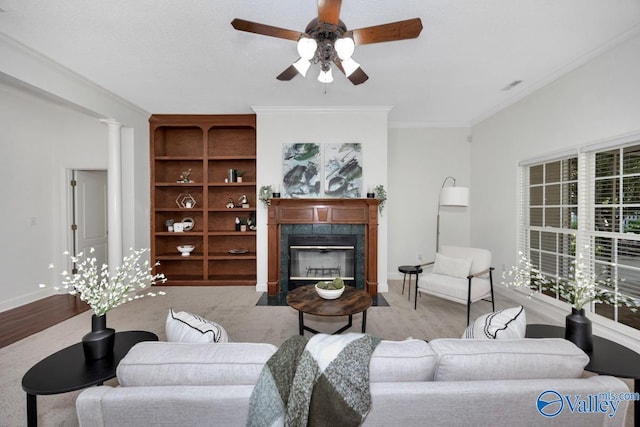 119 Cannes Dr, Brownsboro, AL 35741 - living area with a ceiling fan, a fireplace, crown molding, and carpet