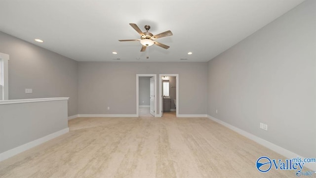 unfurnished room with ceiling fan