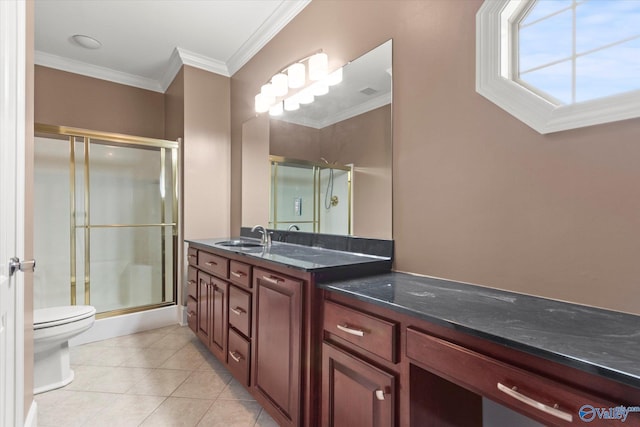 bathroom featuring tile patterned flooring, vanity, an enclosed shower, ornamental molding, and toilet