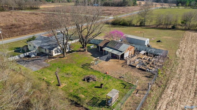 birds eye view of property featuring a rural view