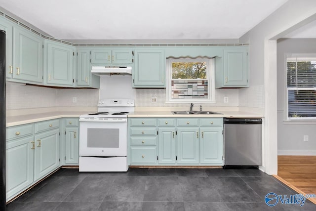 kitchen with electric range, dishwasher, a healthy amount of sunlight, and sink