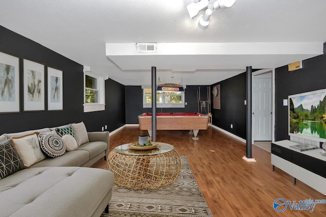 living room with billiards and hardwood / wood-style flooring