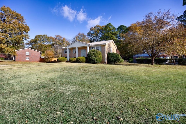 view of front of property with a front yard