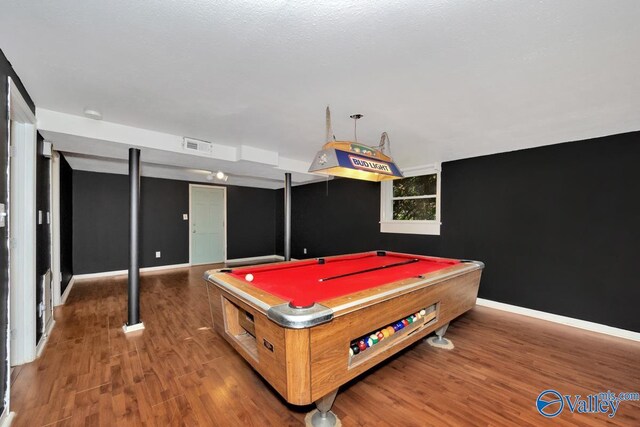 playroom featuring dark hardwood / wood-style floors and pool table