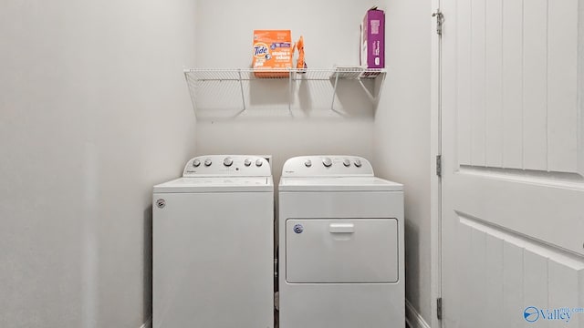 7607 NW Ashor Dr, Huntsville, AL 35806 - washroom featuring washer and dryer