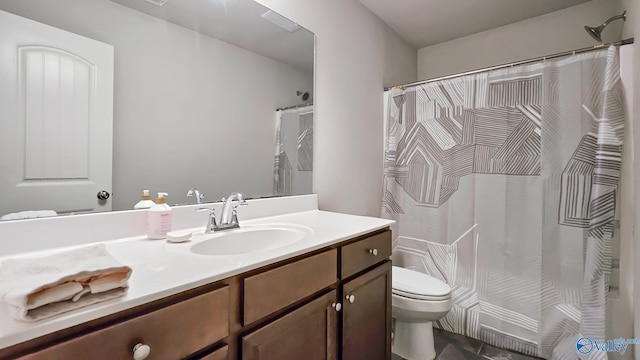 7607 NW Ashor Dr, Huntsville, AL 35806 - bathroom with vanity and a shower with curtain