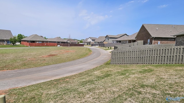 7607 NW Ashor Dr, Huntsville, AL 35806 - view of asphalt road with a residential view