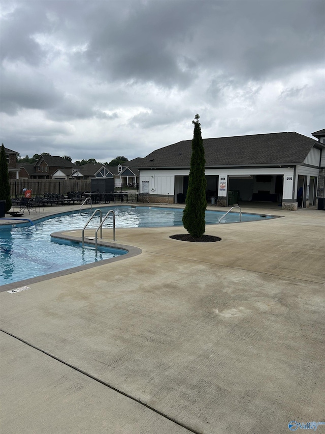 7607 NW Ashor Dr, Huntsville, AL 35806 - community pool featuring a patio