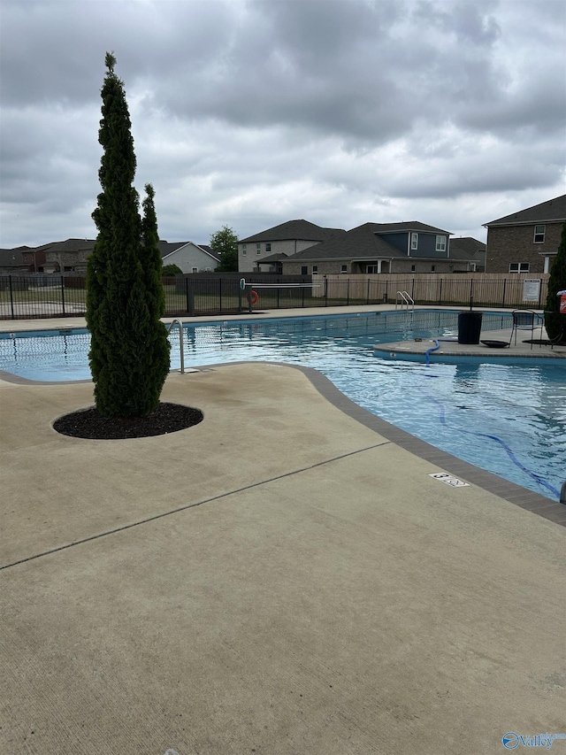 7607 NW Ashor Dr, Huntsville, AL 35806 - community pool with a patio area