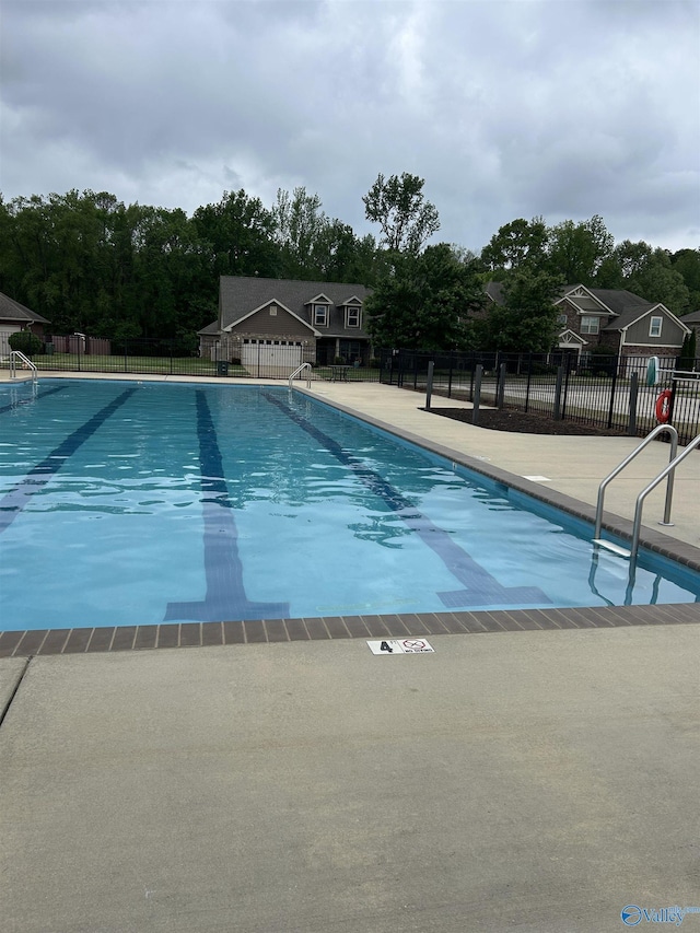 7607 NW Ashor Dr, Huntsville, AL 35806 - community pool featuring a patio area
